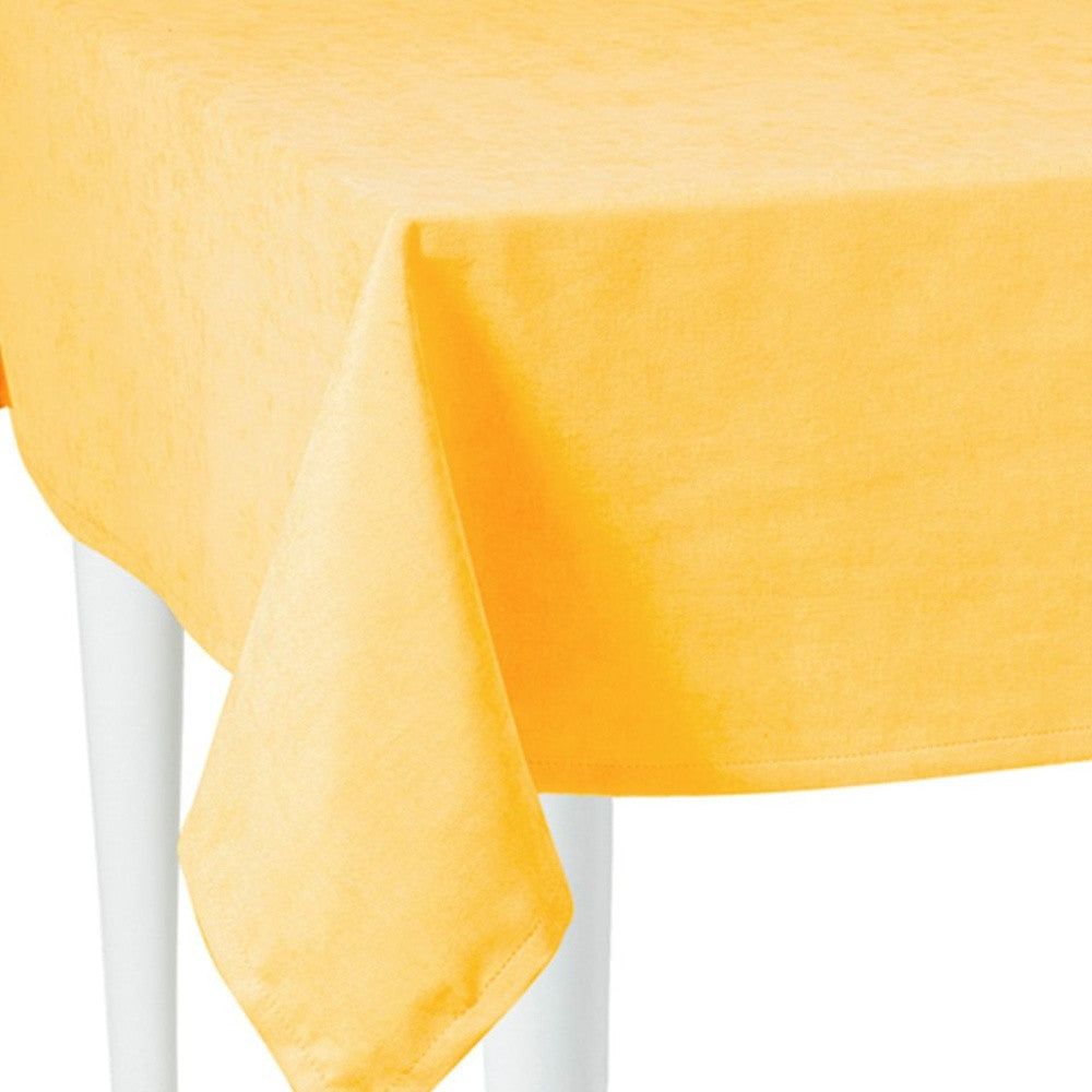 HomeRoots 104" Merry Christmas Rectangle Tablecloth in Yellow