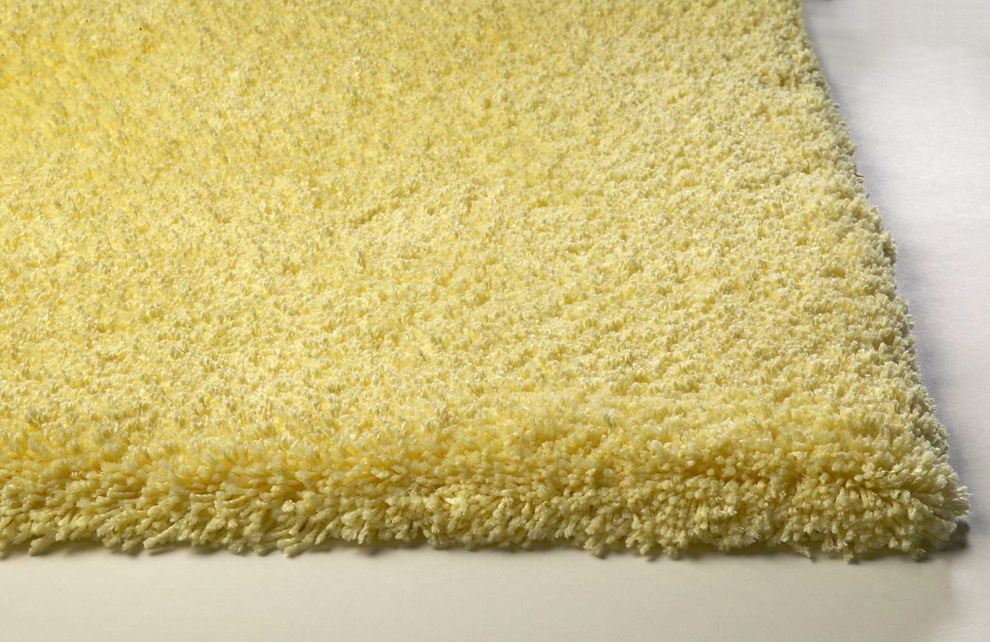 HomeRoots 2' x 4' Canary Yellow Indoor Shag Rug