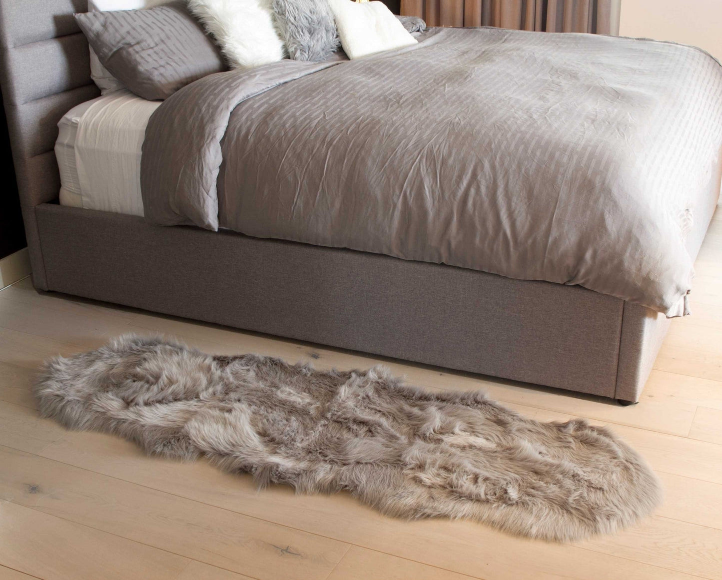 HomeRoots 2' x 6' Sheepskin Double Area Rug in Gray Finish