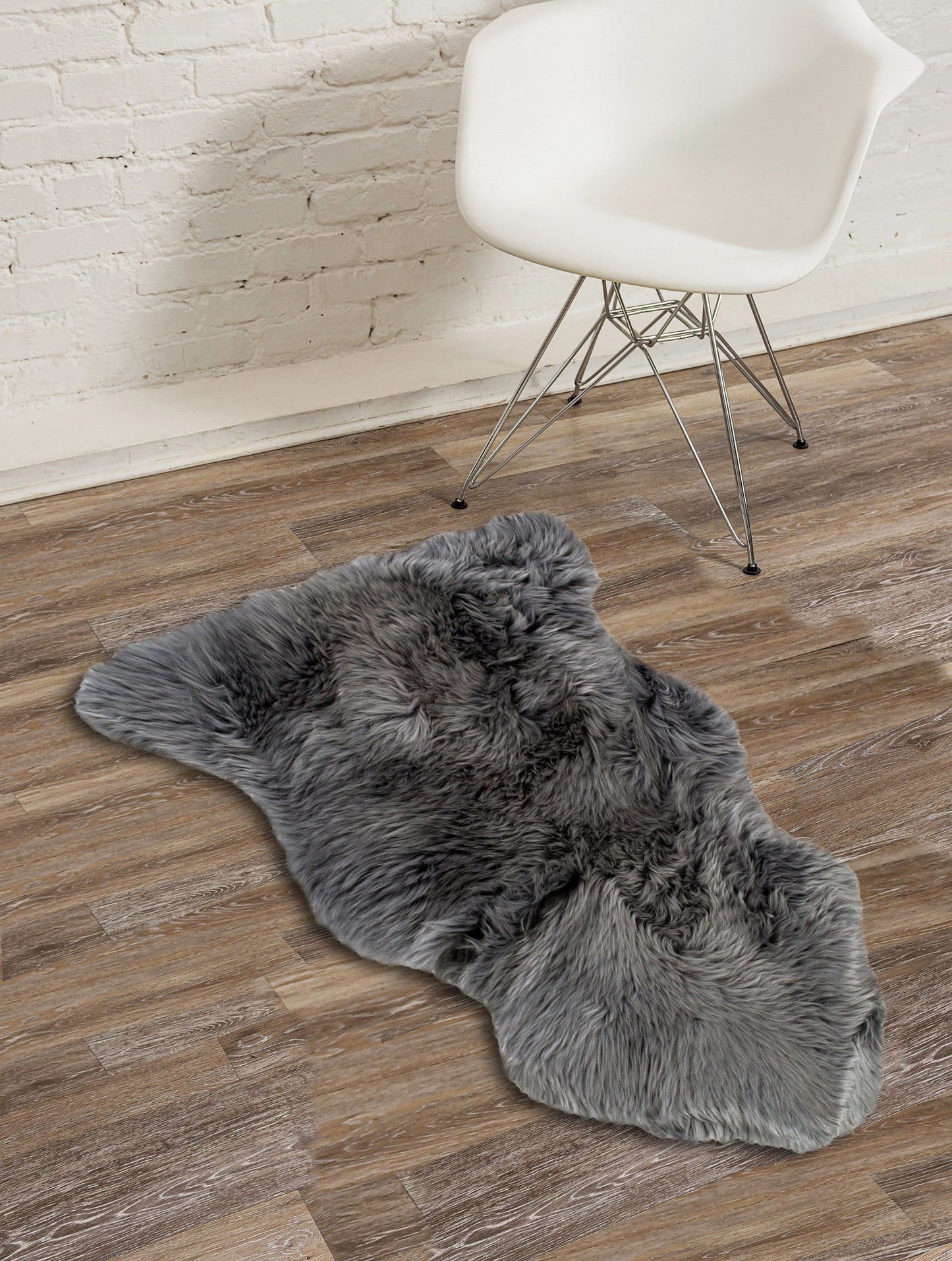 HomeRoots 24" x 36" x 1.5" Single Sheepskin Area Rug in Gray Finish