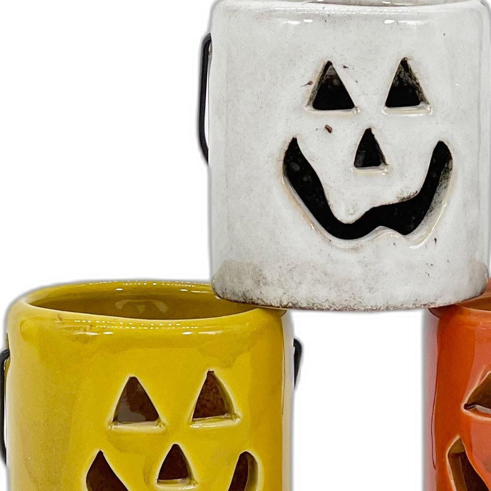 HomeRoots 3" Set of Three Jack-O-Lantern Ceramic Candle Holders