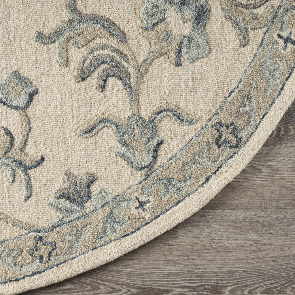 HomeRoots 5' Round Beige and Blue Filigree Area Rug