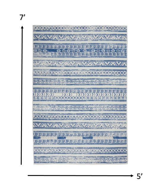HomeRoots 5’ x 7’ Distressed Area Rug in Ivory and Blue Finish