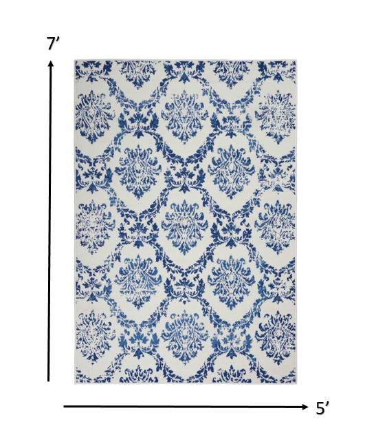 HomeRoots 5’ x 7’ Ivory and Navy Damask Area Rug