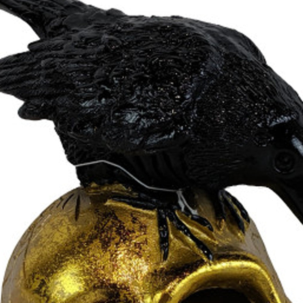 HomeRoots LED Gold Skull and Black Crow Sculpture