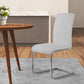 Benzara Silver Metal Cantilever Base Dining Chair With White Leatherette Upholstered Seat and Backrest Set of Two