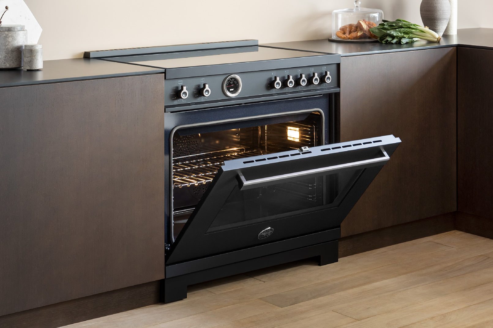 Bertazzoni Professional Series 36" 5 Heating Zones Stainless Steel Freestanding Induction Range With 5.7 Cu.Ft. Electric Self-Clean Oven and Cast Iron Griddle