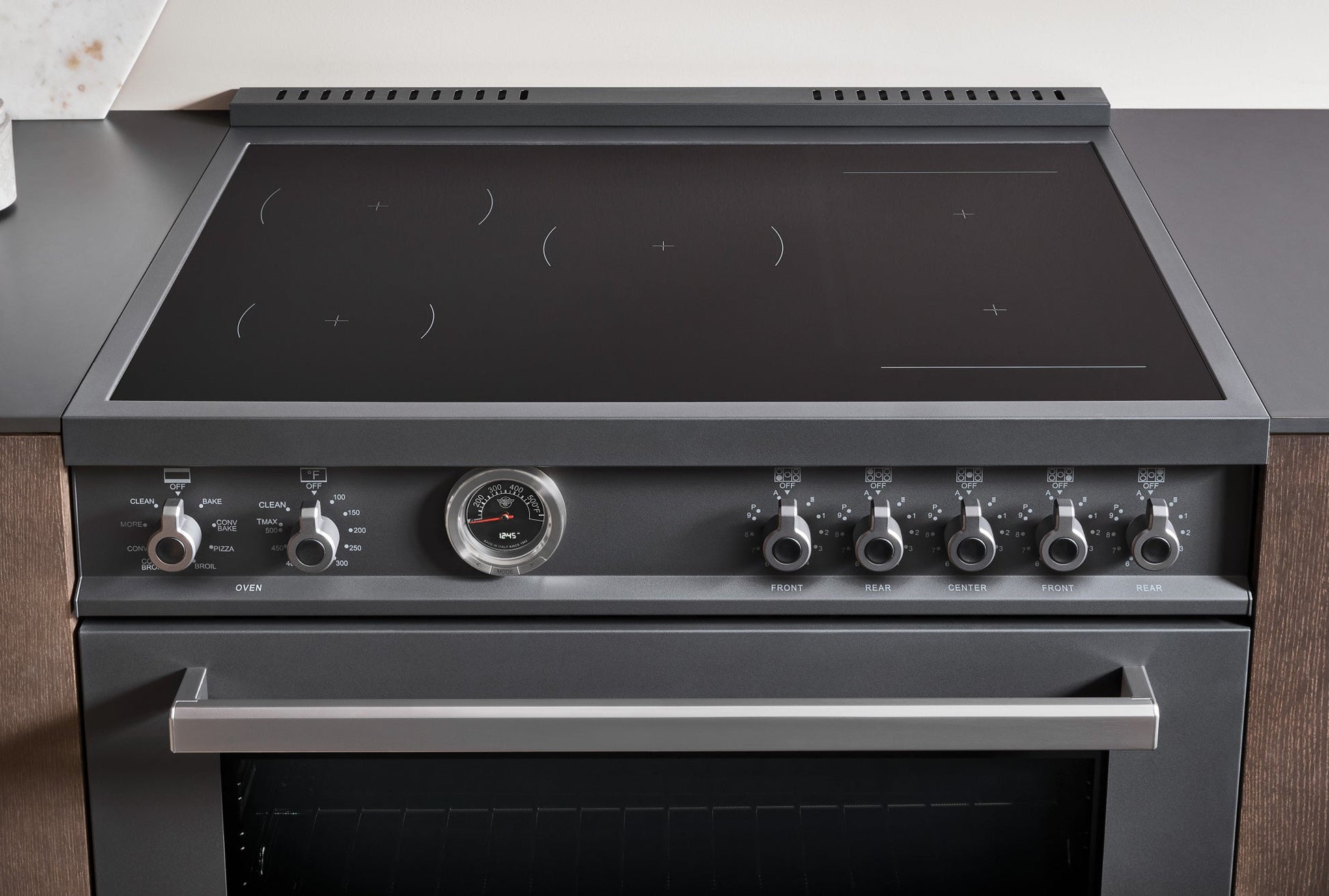 Bertazzoni Professional Series 48" 6 Heating Zones Carbonio Freestanding Induction Range With 7 Cu.Ft. Electric Self-Clean Double Oven and Cast Iron Griddle