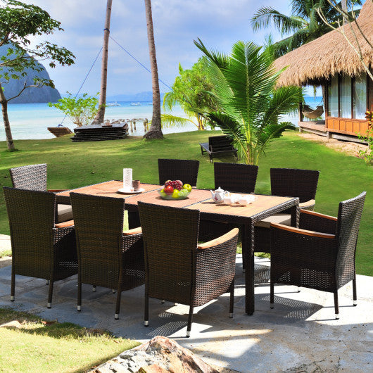 Costway 9 Pieces Rattan Dining Set with Acacia Wood Table and Stackable Cushioned Chairs