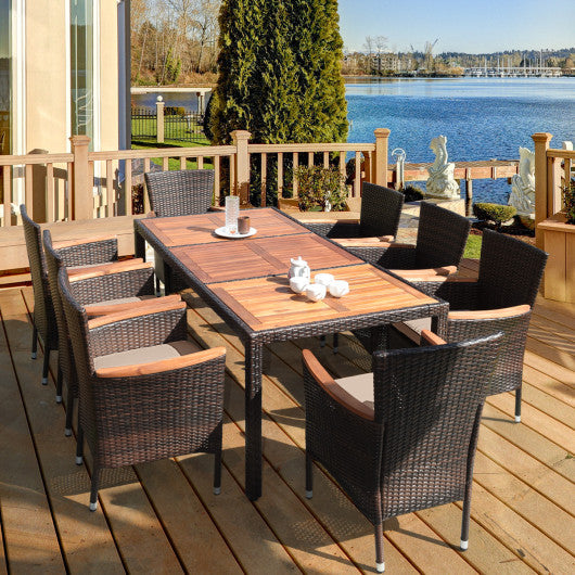 Costway 9 Pieces Rattan Dining Set with Acacia Wood Table and Stackable Cushioned Chairs