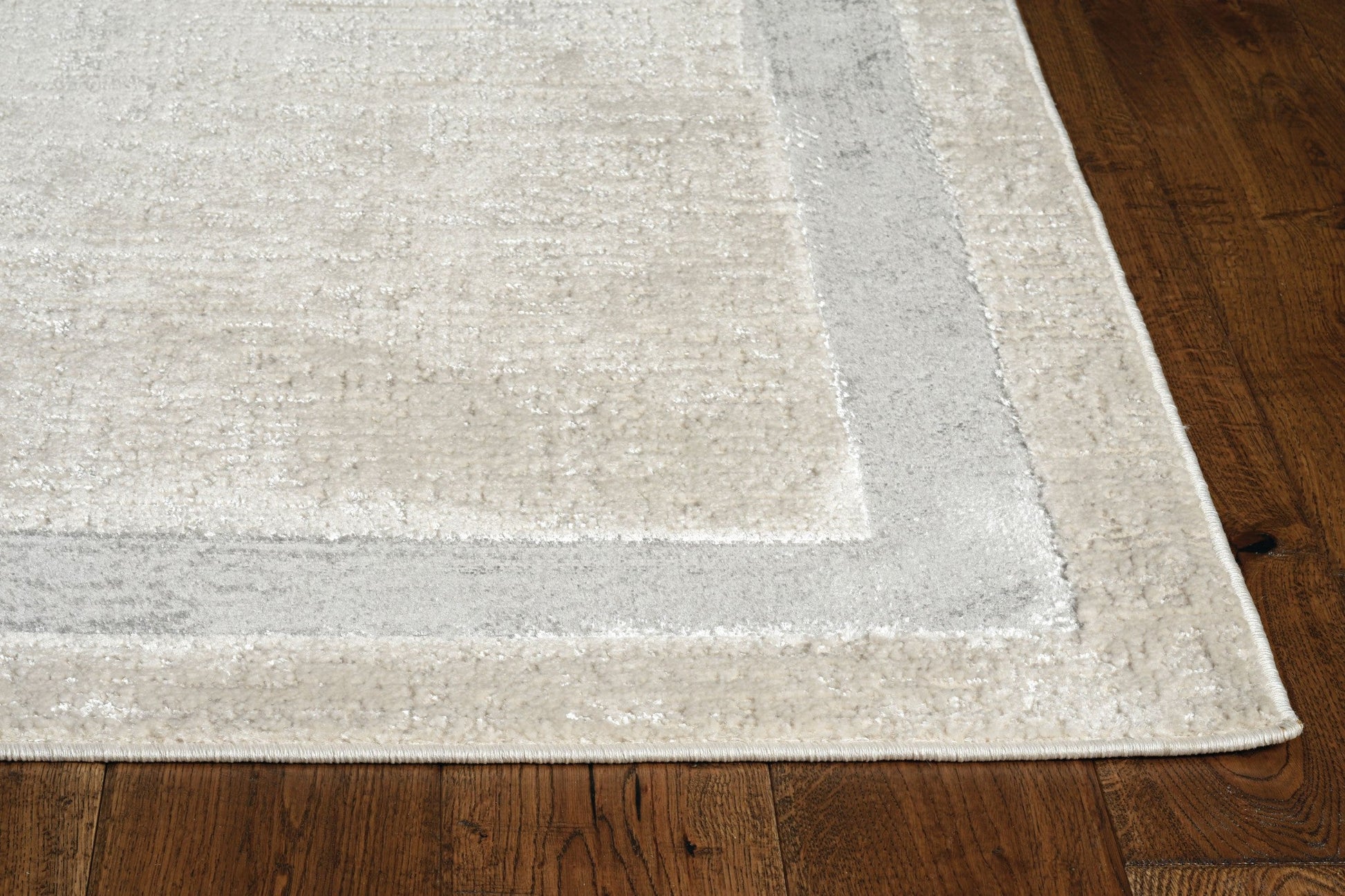 HomeRoots 10' x 13' Ivory Silver Machine Woven Bordered Indoor Area Rug