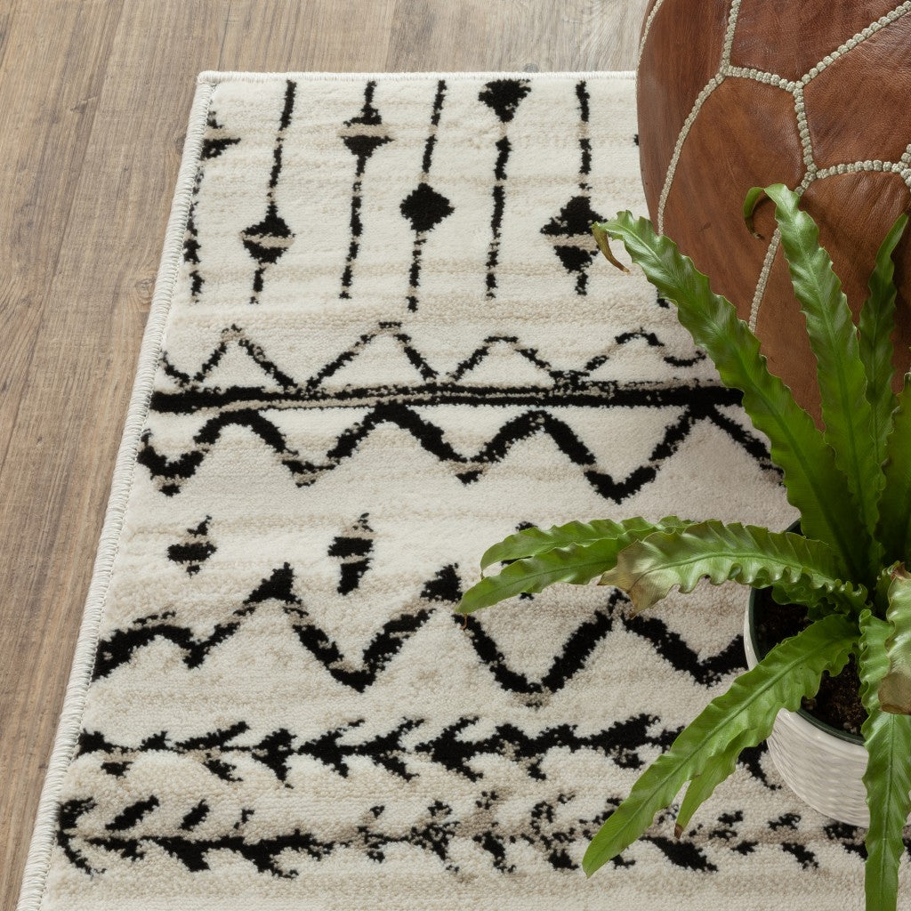 HomeRoots 10' x 13' Ivory and Black Eclectic Patterns Indoor Area Rug