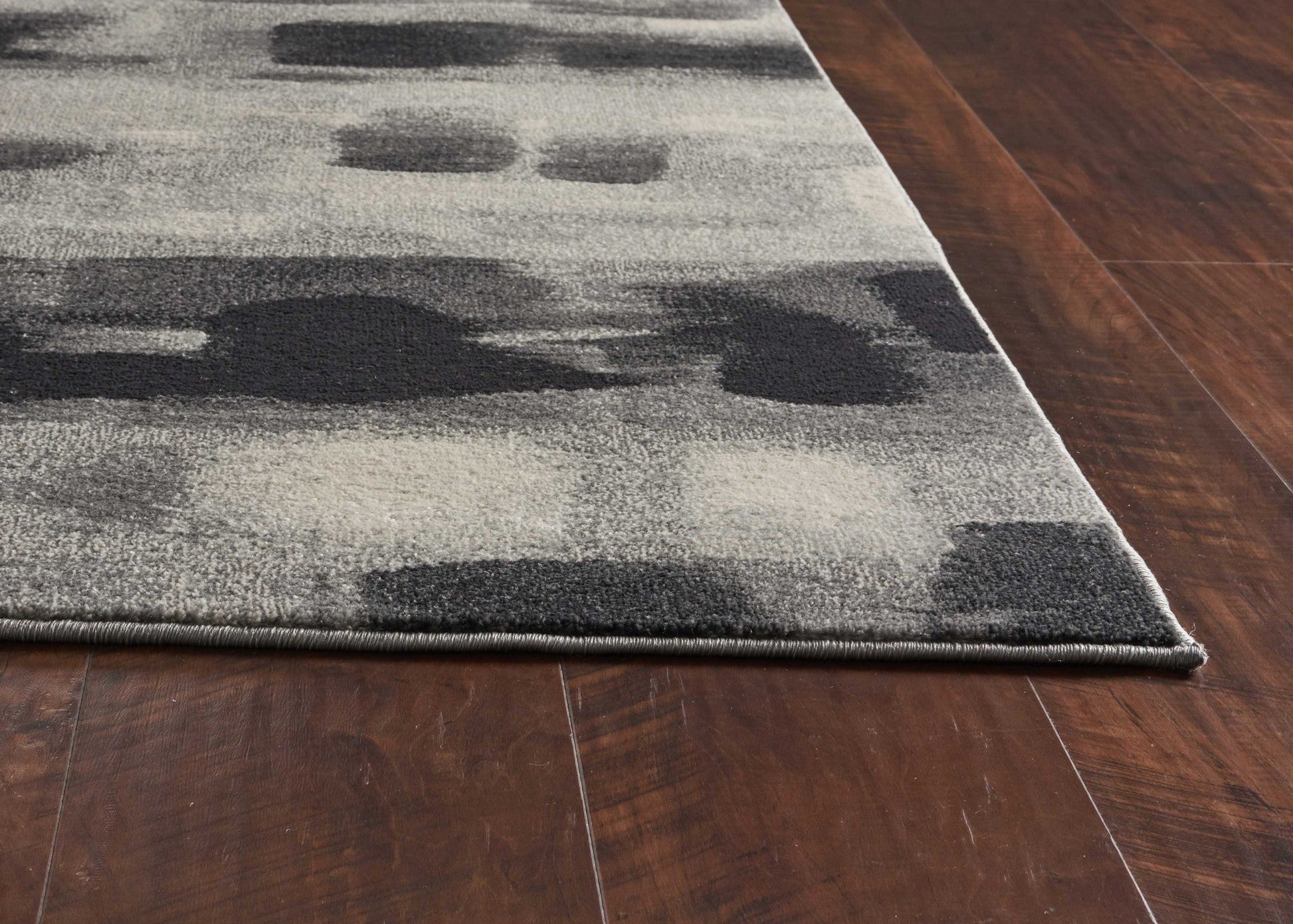 HomeRoots 10' x 13' Shades of Grey Machine Woven Abstract Brushstroke Indoor Area Rug