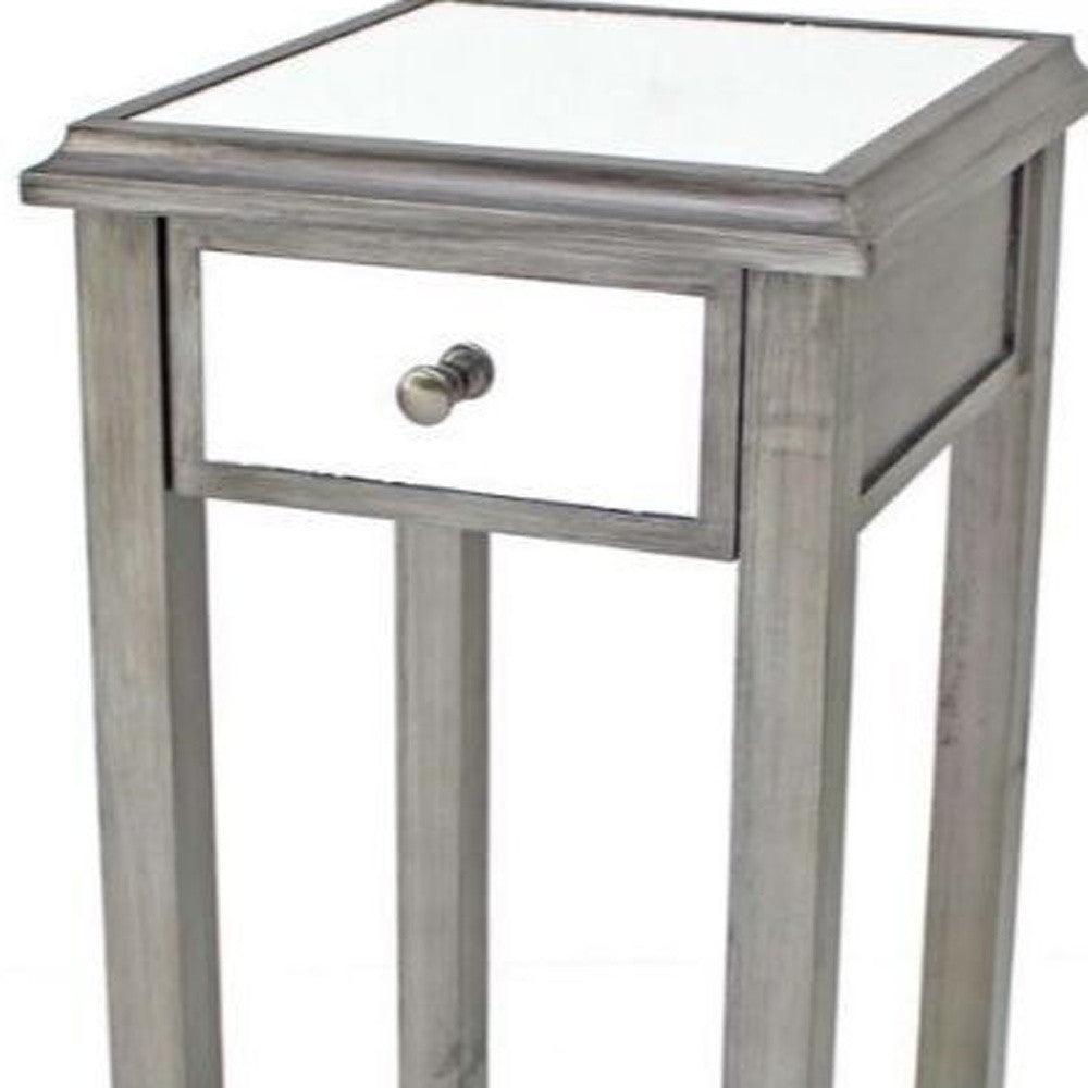 HomeRoots 14.25" x 14.25" x 29.75" Coastal Style Mirrored End Table With 1 Drawer in Silver Finish