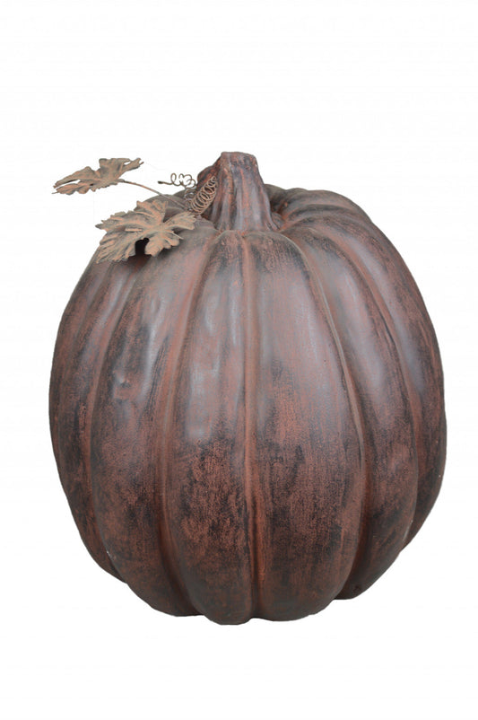 HomeRoots 17" Distressed Orange and Black Rustic Pumpkin Sculpture