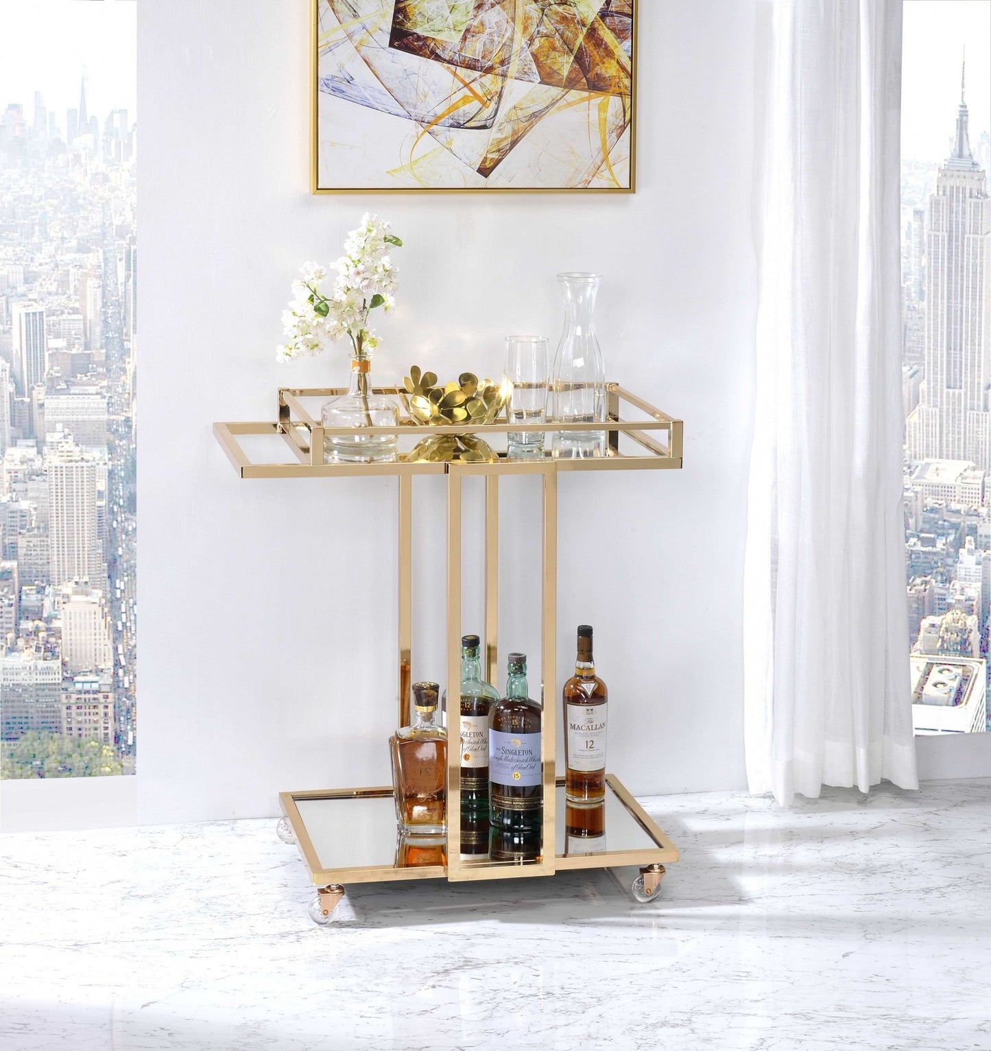 HomeRoots 17" X 29" X 33" Metal Casters Serving Cart in Gold Finish With Mirror Accents