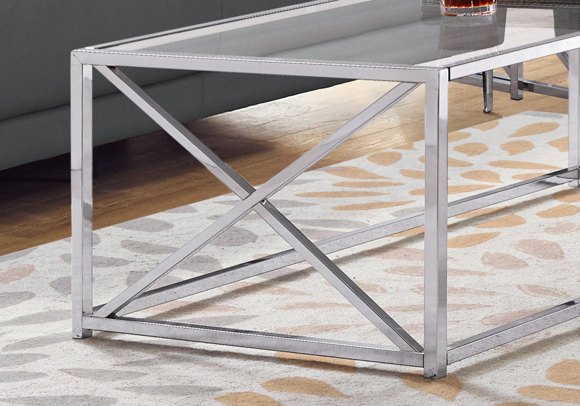 HomeRoots 17.25" Chrome Metal and Clear Tempered Glass Coffee Table
