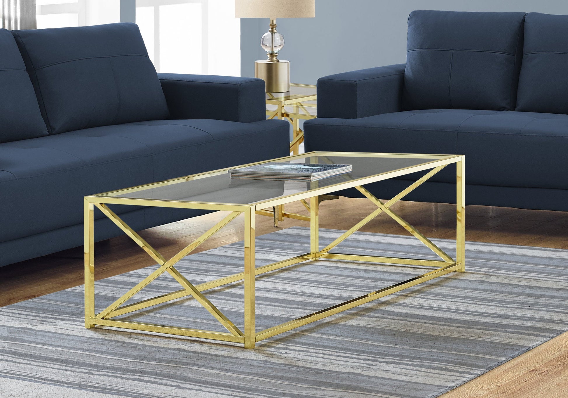 HomeRoots 17.25" Gold Metal and Clear Tempered Glass Coffee Table