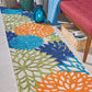 HomeRoots 2’ x 10' Orange Outdoor Runner Rug With Floral Finish