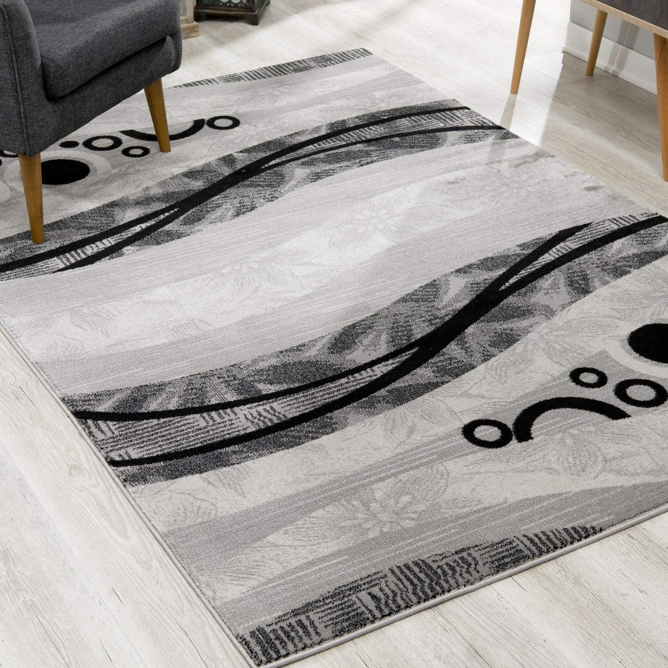 HomeRoots 2' x 13' Gray and Black Abstract Waves Runner Rug