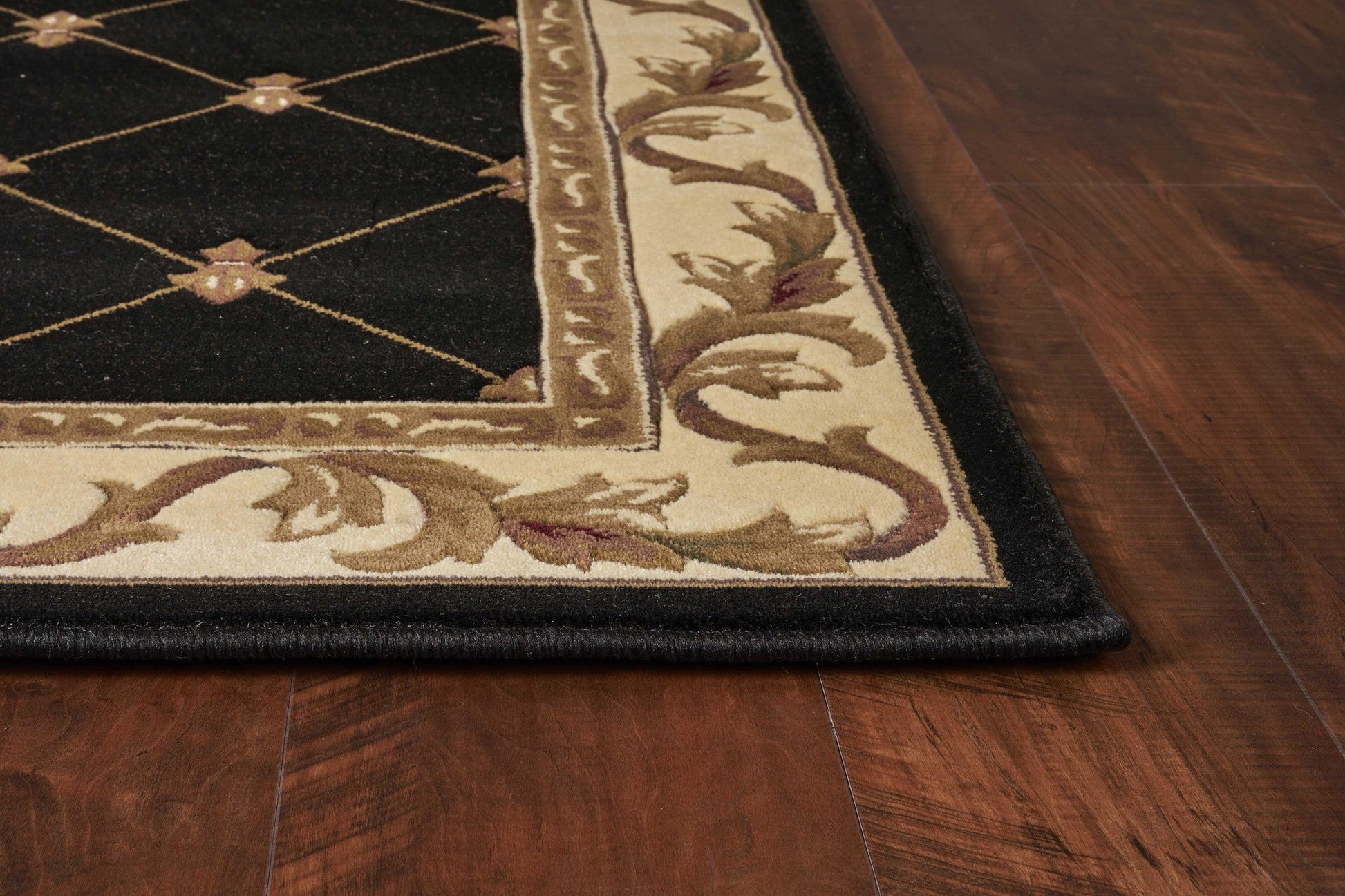 HomeRoots 2' x 3' Black Machine Woven Hand Carved Fleur De Lis Indoor Accent Rug
