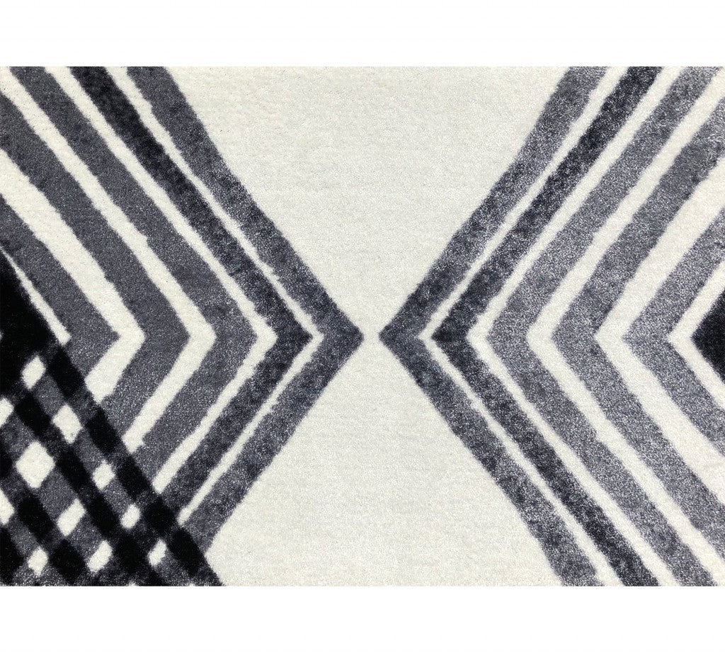 HomeRoots 2' x 3' Black and Gray Abstract Arrow Washable Floor Mat