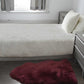 HomeRoots 2' x 3' Burgundy New Zealand Natural Sheepskin Rug