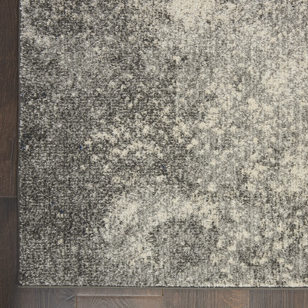 HomeRoots 2' x 3' Charcoal and Ivory Abstract Scatter Rug