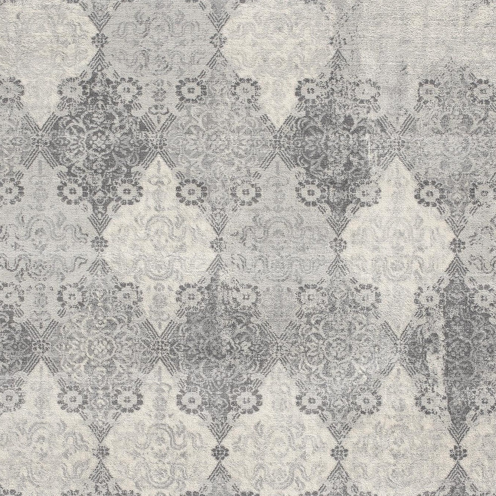 HomeRoots 2’ x 3’ Distressed Trellis Pattern Scatter Rug in Gray Finish