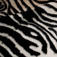 HomeRoots 2' x 3' Faux Zebra Hide Black And White Area Rug