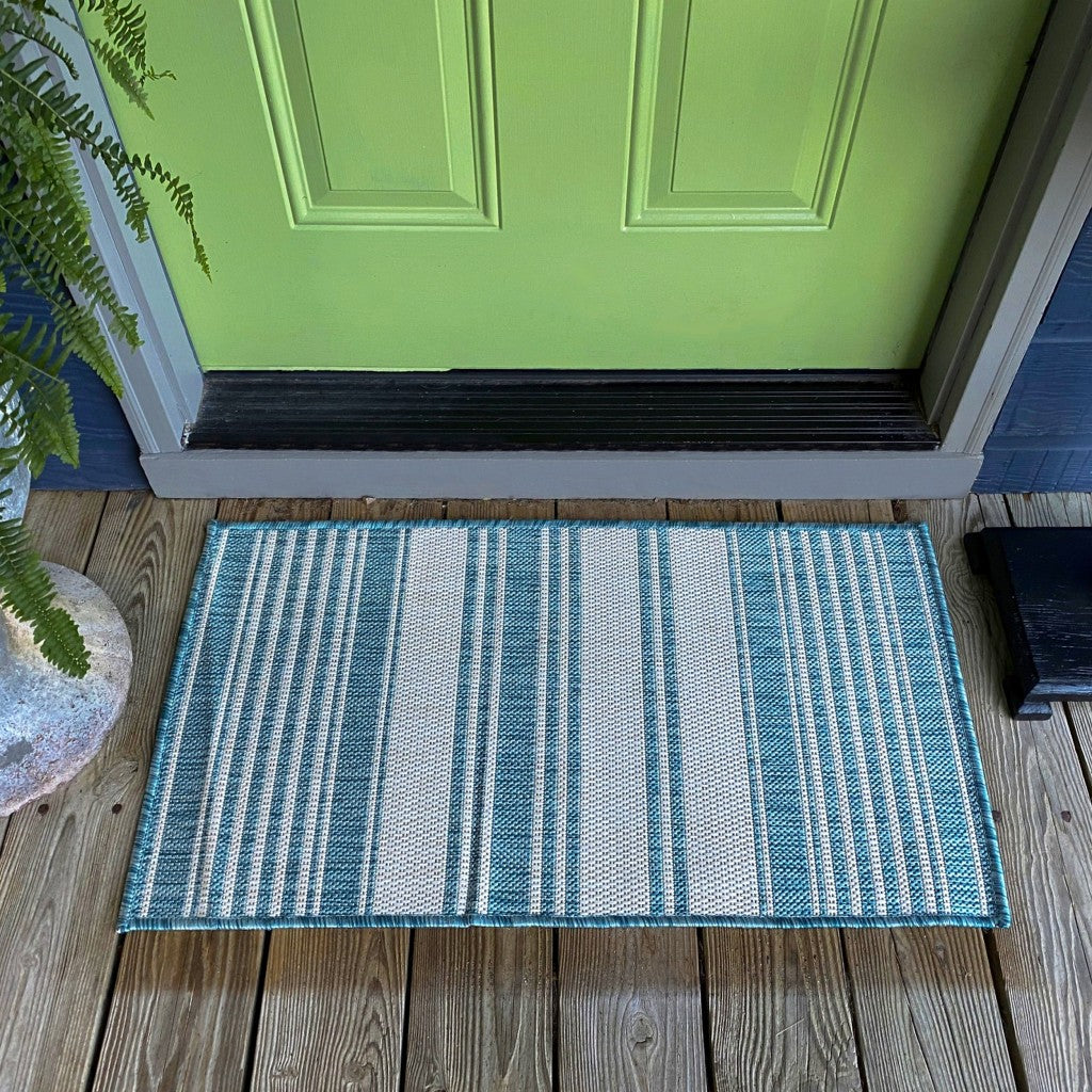 HomeRoots 2' x 3' Teal Uneven Stripe Indoor Outdoor Scatter Rug