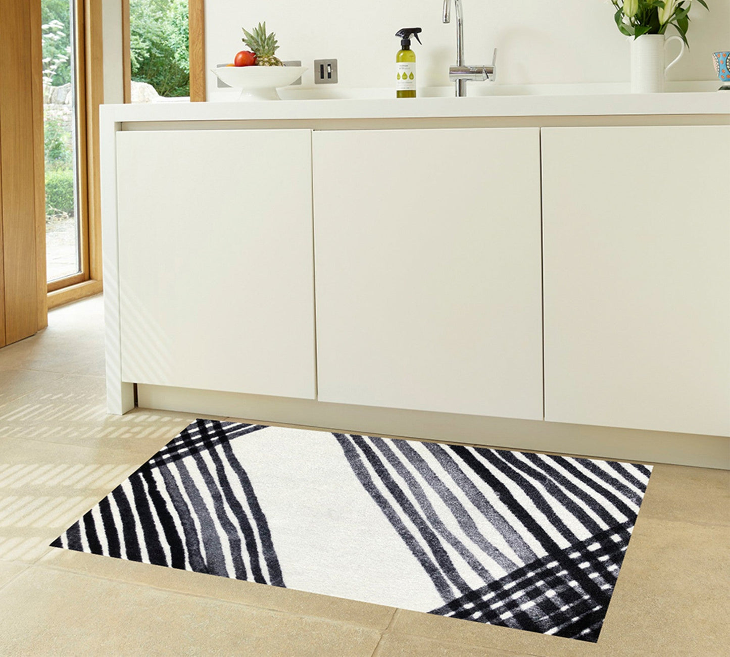 HomeRoots 2' x 4' Black and Gray Abstract Arrow Washable Floor Mat