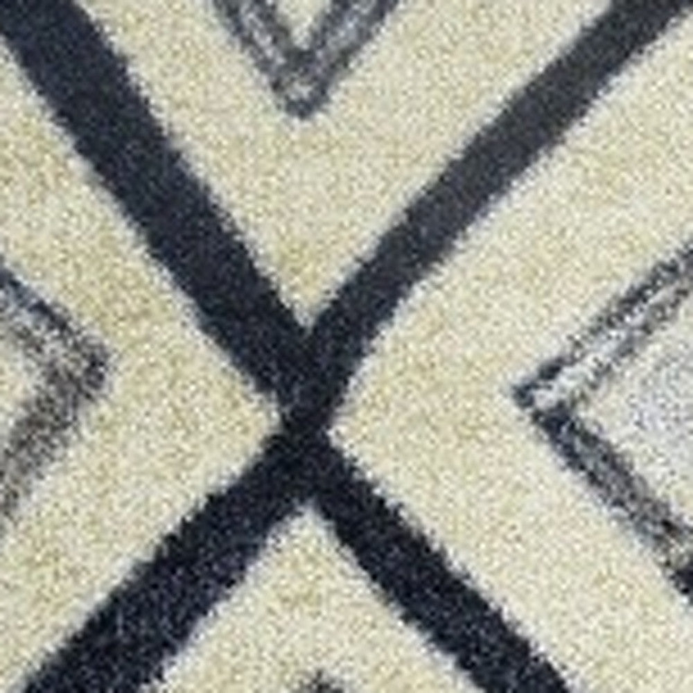 HomeRoots 2' x 4' Black and Gray Modern Tribal Washable Floor Mat