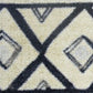 HomeRoots 2' x 4' Black and Gray Modern Tribal Washable Floor Mat