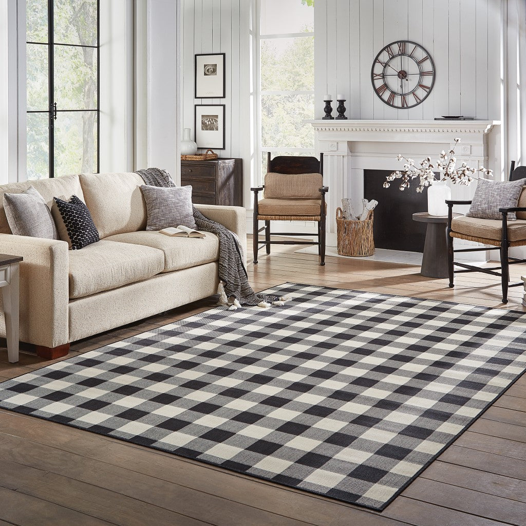 HomeRoots 2’ x 4’ Black and Ivory Gingham Indoor Outdoor Area Rug