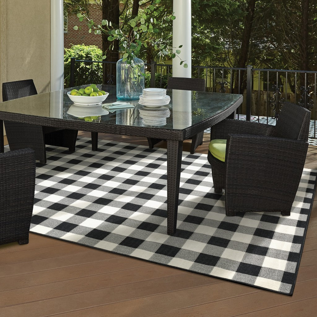 HomeRoots 2’ x 4’ Black and Ivory Gingham Indoor Outdoor Area Rug