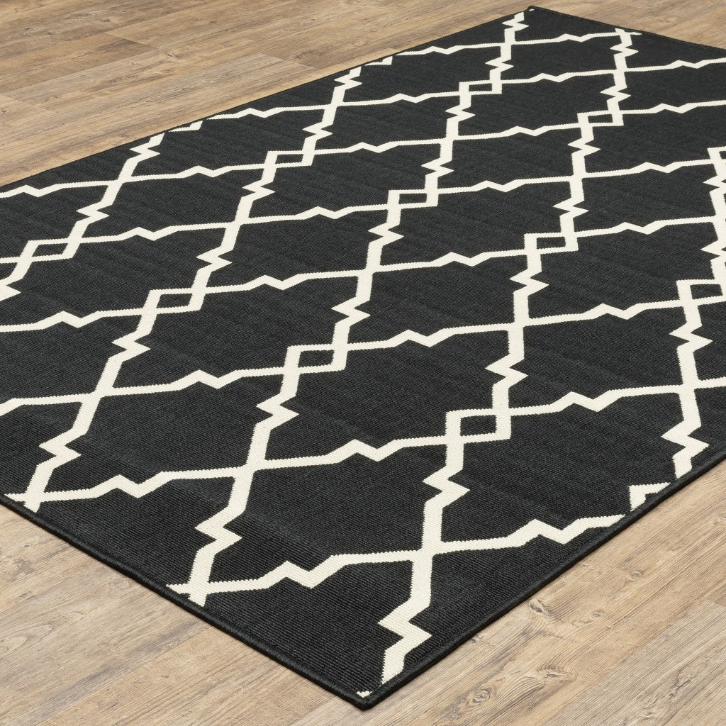 HomeRoots 2’ x 4’ Black and Ivory Trellis Indoor Outdoor Area Rug