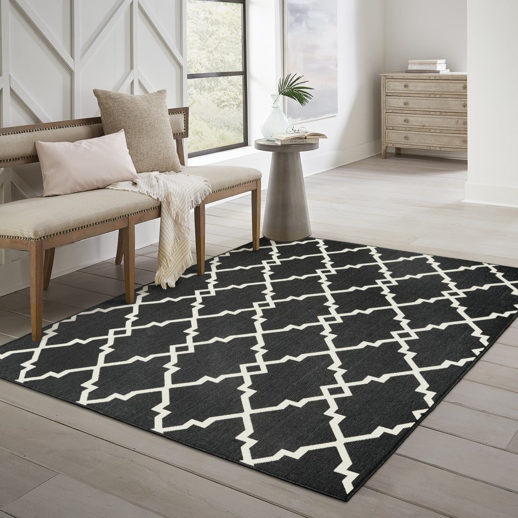 HomeRoots 2’ x 4’ Black and Ivory Trellis Indoor Outdoor Area Rug