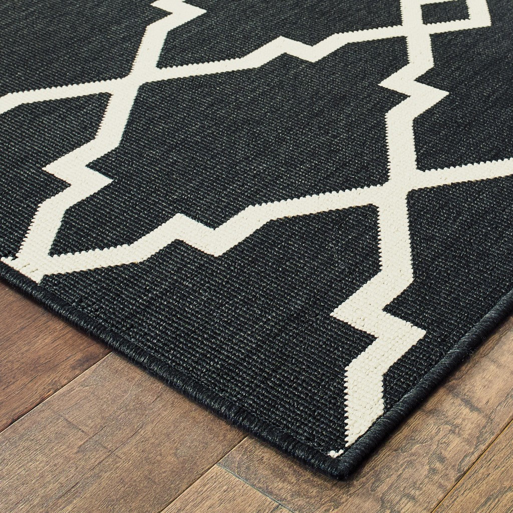 HomeRoots 2’ x 4’ Black and Ivory Trellis Indoor Outdoor Area Rug