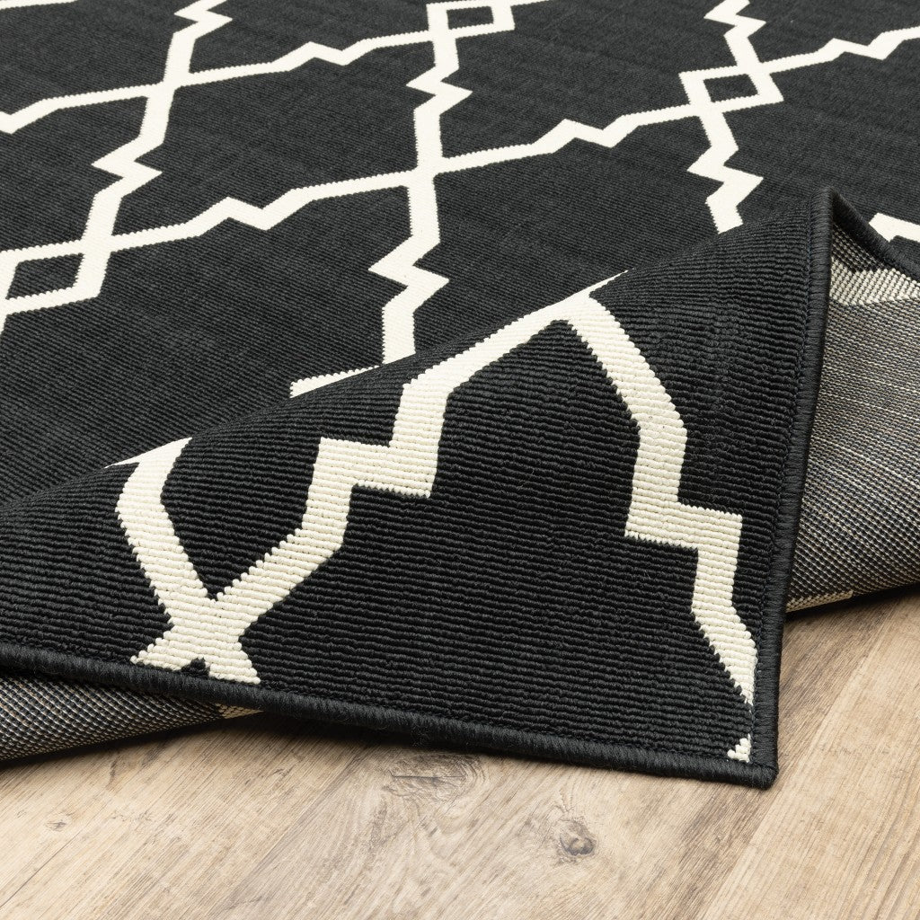 HomeRoots 2’ x 4’ Black and Ivory Trellis Indoor Outdoor Area Rug