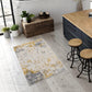 HomeRoots 2' x 4' Gold and Gray Abstract Area Rug