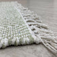 HomeRoots 2' x 4' Green and White Chevron Striped Area Rug