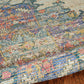 HomeRoots 2' x 4' Hand Woven Diamond Medallion Indoor Accent Rug With Blue and Rust Orange Finish