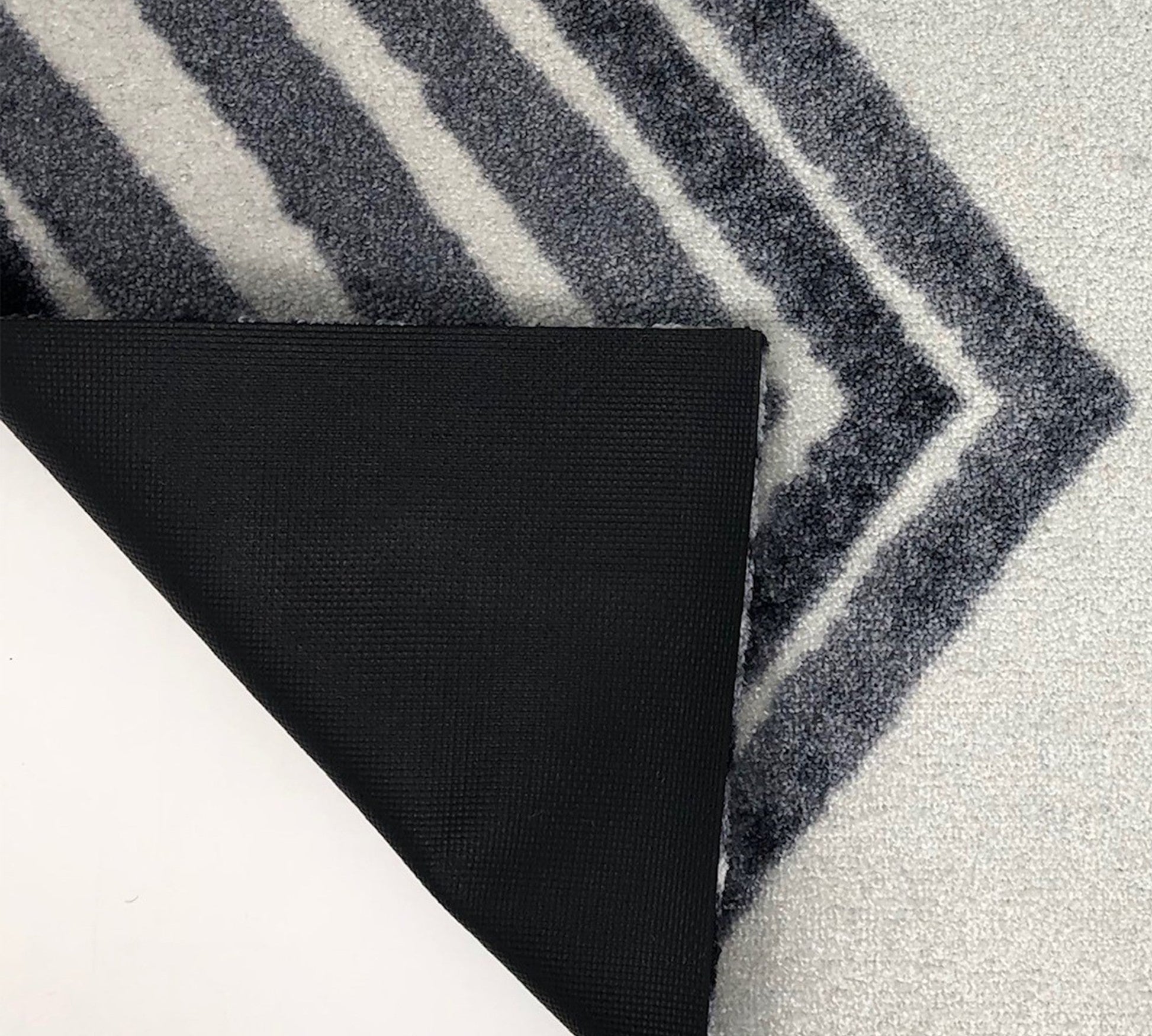 HomeRoots 2' x 6' Black and Gray Abstract Arrow Washable Runner Rug