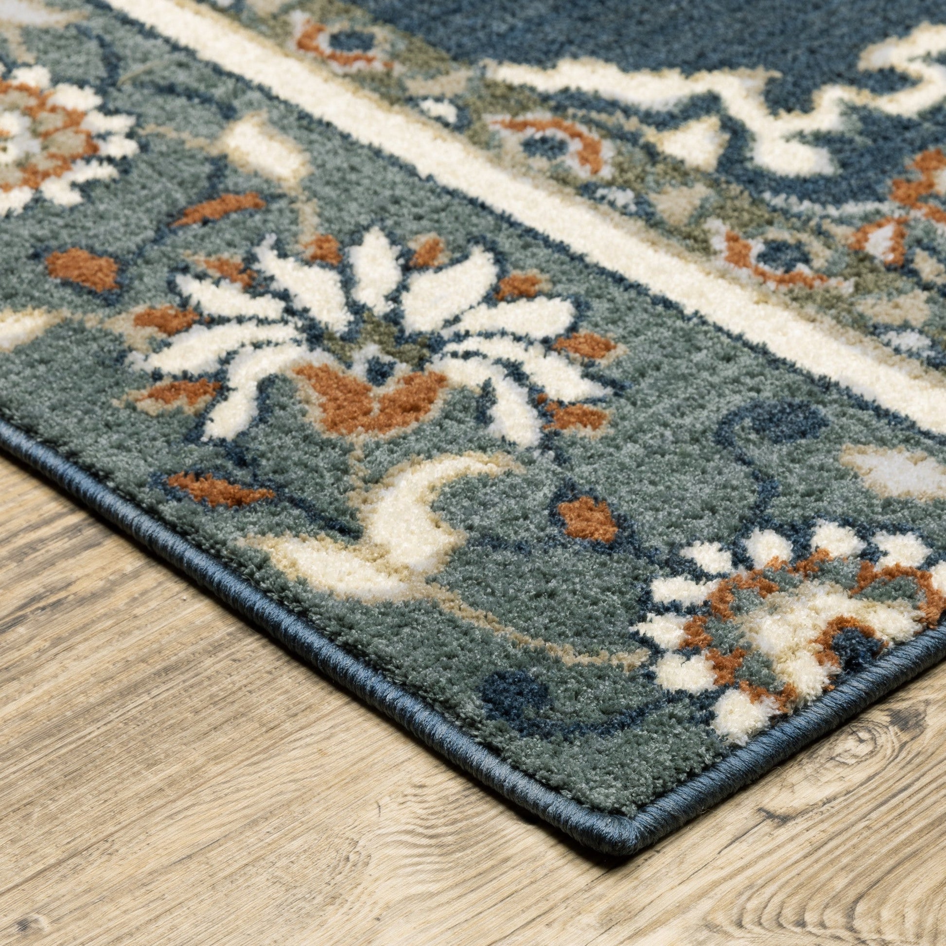 HomeRoots 2' x 7' Blue and Beige Floral Medallion Indoor Runner Rug