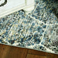 HomeRoots 2' x 7' Grey or Teal Geometric Hexagon Runner Rug with Fringe