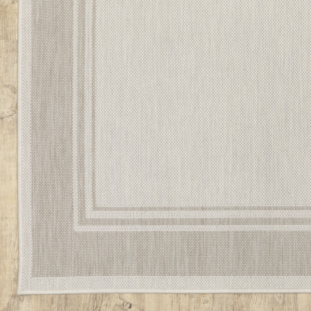 HomeRoots 2' x 7' Ivory and Gray Bordered Indoor Outdoor Runner Rug