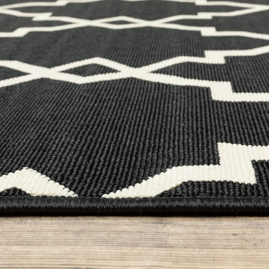 HomeRoots 2' x 8' Black and Ivory Trellis Indoor Outdoor Runner Rug