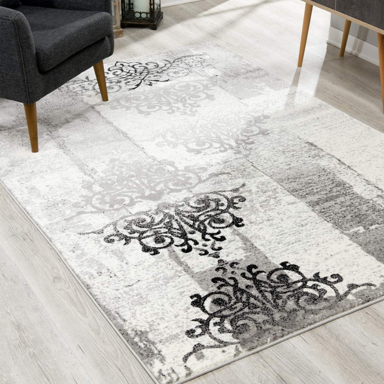 HomeRoots 2' x 8' Gray Faded Filigree Pattern Runner Rug