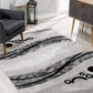 HomeRoots 2' x 8' Gray and Black Abstract Waves Runner Rug
